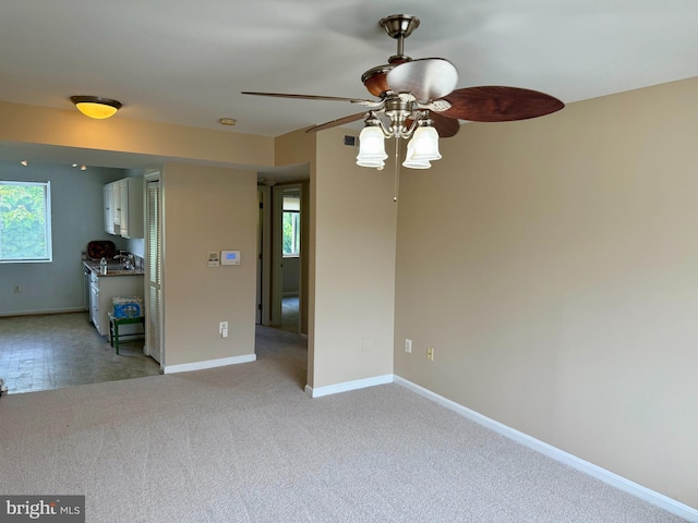 4212 Benning Rd NE Unit 6, Washington, DC 20019 - unfurnished room with healthy amount of natural light, a ceiling fan, and baseboards