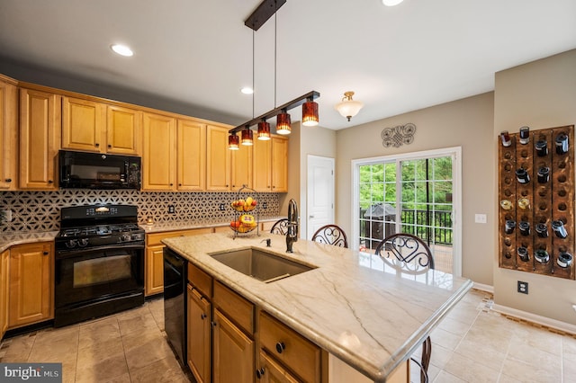 41 Musket Ct, West Chester, PA 19382 - kitchen with black appliances, a sink, backsplash, light stone countertops, and light tile patterned floors