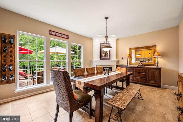 41 Musket Ct, West Chester, PA 19382 - dining room with a large fireplace and baseboards