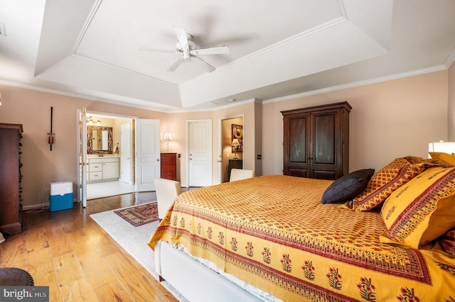 41 Musket Ct, West Chester, PA 19382 - bedroom with a raised ceiling, light wood finished floors, ensuite bathroom, baseboards, and ceiling fan