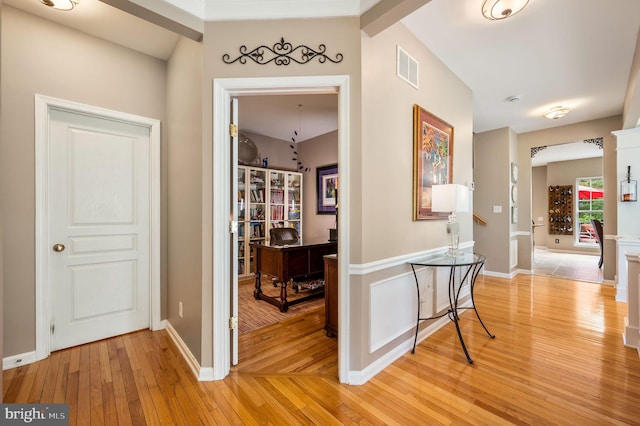 41 Musket Ct, West Chester, PA 19382 - corridor featuring light wood-style flooring, a desk, baseboards, and vaulted ceiling