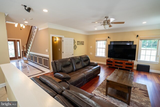 5280 Ten Oaks Rd, Clarksville, MD 21029 - living room featuring healthy amount of natural light, a ceiling fan, stairs, hardwood / wood-style flooring, and ornamental molding