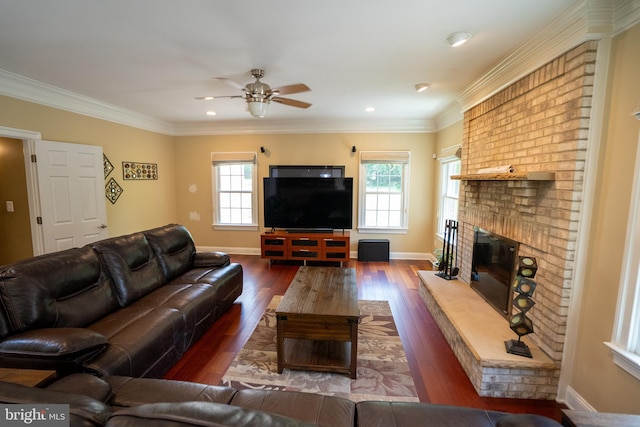 5280 Ten Oaks Rd, Clarksville, MD 21029 - living room with a ceiling fan, dark wood-type flooring, a brick fireplace, ornamental molding, and recessed lighting