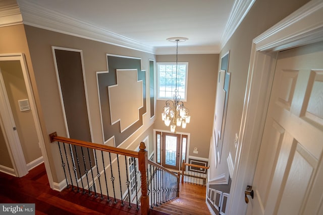5280 Ten Oaks Rd, Clarksville, MD 21029 - stairs with a chandelier, ornamental molding, and wood finished floors