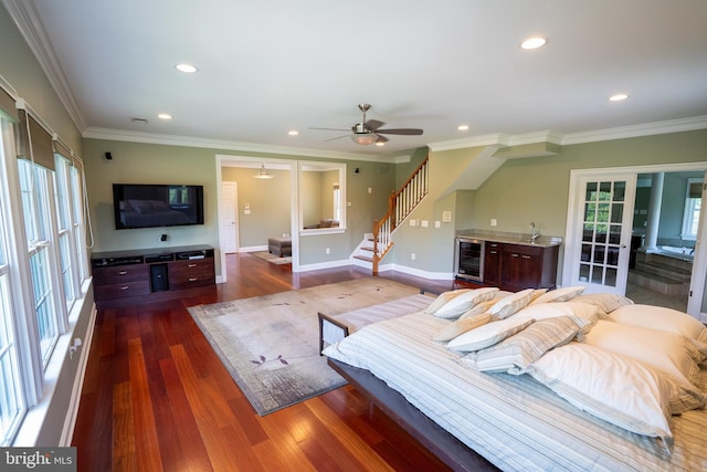 5280 Ten Oaks Rd, Clarksville, MD 21029 - bedroom featuring beverage cooler, multiple windows, crown molding, dark wood-type flooring, and recessed lighting
