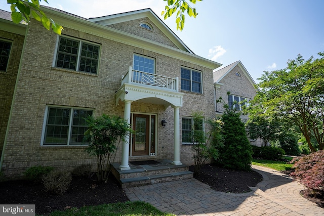 5280 Ten Oaks Rd, Clarksville, MD 21029 - view of front of property featuring a balcony and brick siding