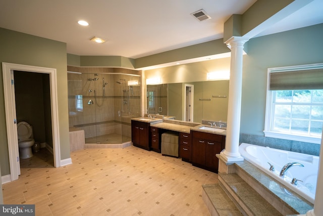 5280 Ten Oaks Rd, Clarksville, MD 21029 - full bath featuring ornate columns, a shower stall, vanity, a garden tub, and recessed lighting
