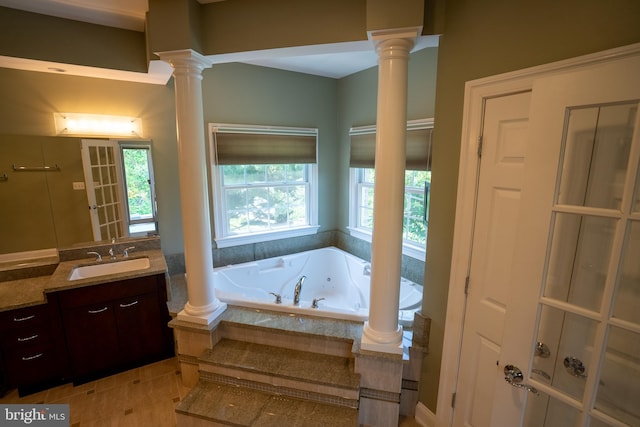 5280 Ten Oaks Rd, Clarksville, MD 21029 - bathroom featuring ornate columns, healthy amount of natural light, and vanity