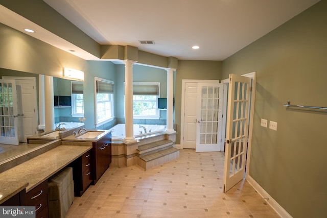 5280 Ten Oaks Rd, Clarksville, MD 21029 - bathroom featuring ornate columns, french doors, a bath, tile patterned floors, and recessed lighting