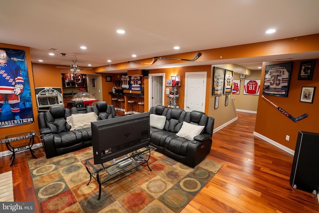 5280 Ten Oaks Rd, Clarksville, MD 21029 - living area featuring hardwood / wood-style flooring, recessed lighting, and a bar