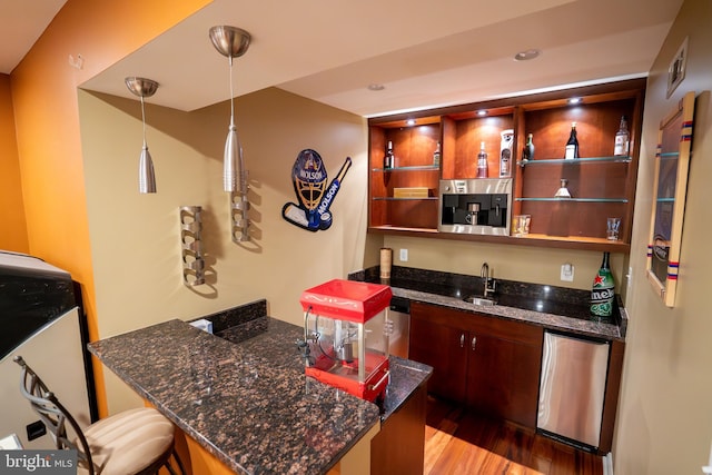 5280 Ten Oaks Rd, Clarksville, MD 21029 - indoor wet bar with wood finished floors, refrigerator, recessed lighting, and decorative light fixtures