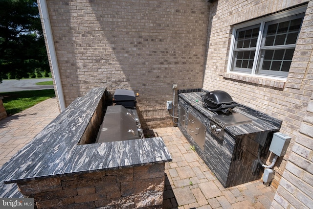 5280 Ten Oaks Rd, Clarksville, MD 21029 - view of patio with an outdoor kitchen