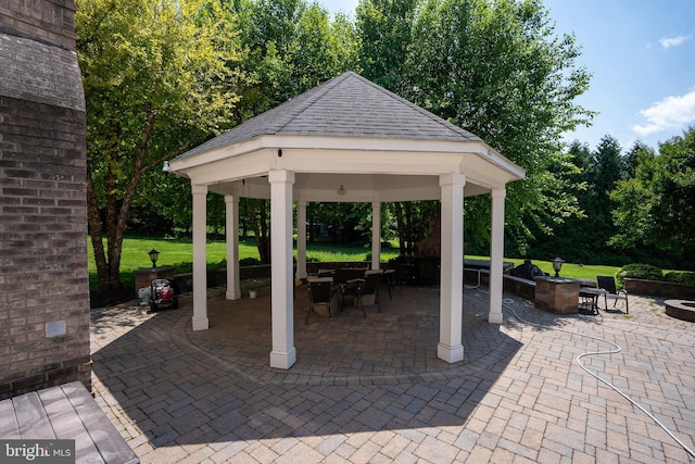 5280 Ten Oaks Rd, Clarksville, MD 21029 - view of patio featuring a fire pit, a gazebo, and outdoor dining area