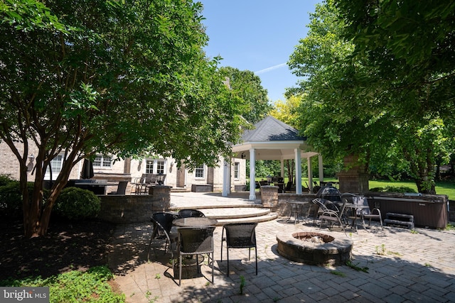 5280 Ten Oaks Rd, Clarksville, MD 21029 - view of patio with a fire pit, a hot tub, and a gazebo