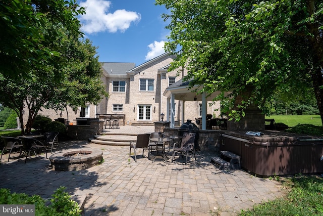 5280 Ten Oaks Rd, Clarksville, MD 21029 - view of patio with a fire pit, a hot tub, and outdoor dining space