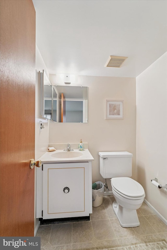 15111 Ina Dr, Philadelphia, PA 19116 - bathroom with toilet, vanity, tile patterned floors, and baseboards