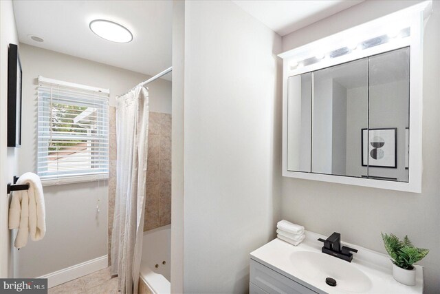 15 Charleswood Ct, Baltimore, MD 21207 - full bathroom featuring vanity, shower / bath combination with curtain, baseboards, and tile patterned flooring