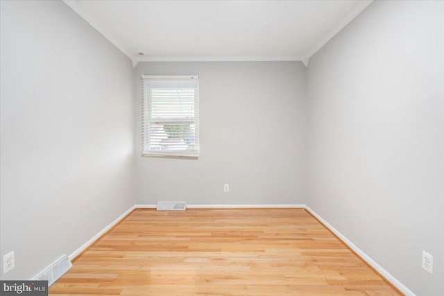 15 Charleswood Ct, Baltimore, MD 21207 - empty room featuring crown molding, wood finished floors, and baseboards