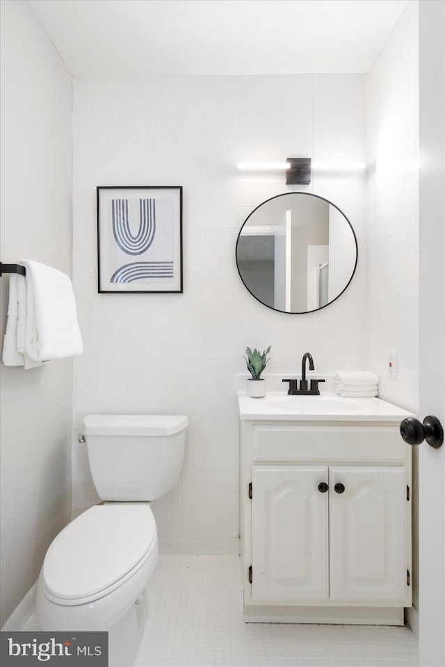 15 Charleswood Ct, Baltimore, MD 21207 - bathroom with vanity, toilet, and tile patterned floors