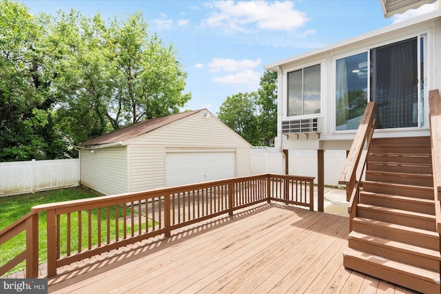 15 Charleswood Ct, Baltimore, MD 21207 - deck with a detached garage, a fenced backyard, and an outbuilding