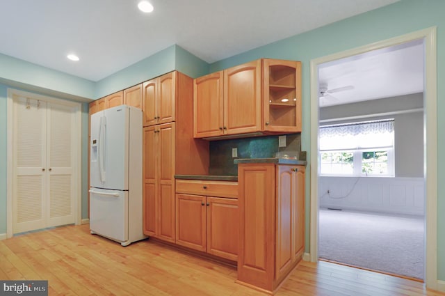 12110 Wilmont Turn, Bowie, MD 20715 - kitchen featuring white refrigerator with ice dispenser, light wood-style floors, dark countertops, a ceiling fan, and recessed lighting