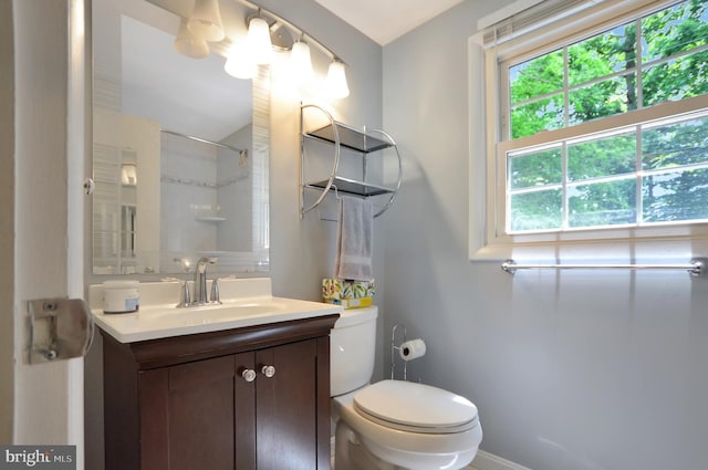 12110 Wilmont Turn, Bowie, MD 20715 - bathroom with vanity, toilet, a shower, and baseboards