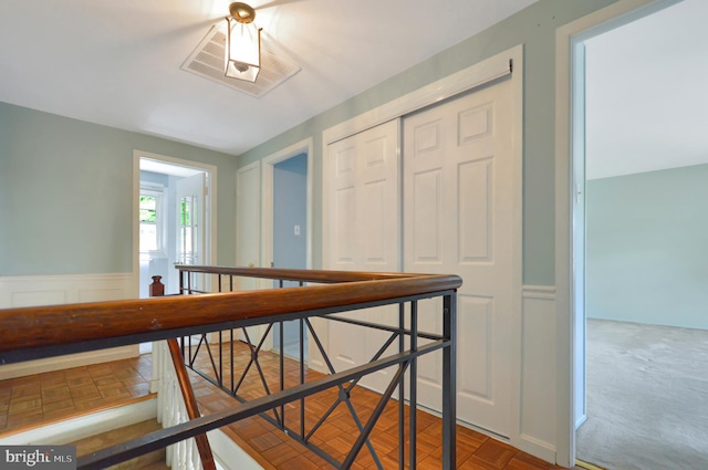 12110 Wilmont Turn, Bowie, MD 20715 - hallway featuring an upstairs landing and wainscoting