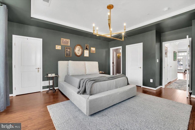 21668 Pattyjean Ter Unit 0, Ashburn, VA 20147 - bedroom featuring wood finished floors, baseboards, a chandelier, and a raised ceiling