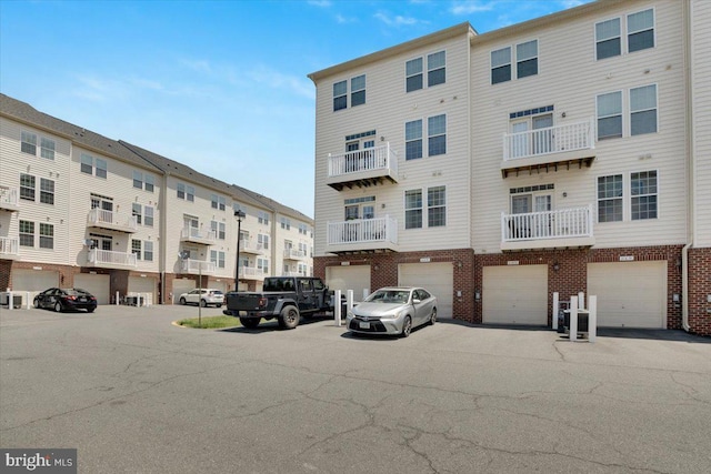 21668 Pattyjean Ter Unit 0, Ashburn, VA 20147 - view of apartment building / complex featuring central AC