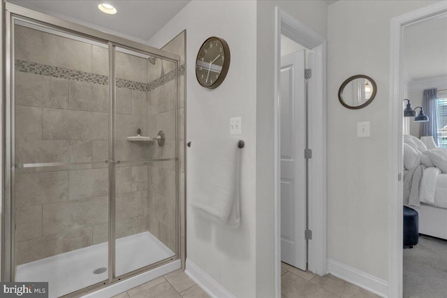 3820 Pentland Hills Dr, Upper Marlboro, MD 20774 - ensuite bathroom featuring a stall shower, baseboards, and tile patterned floors