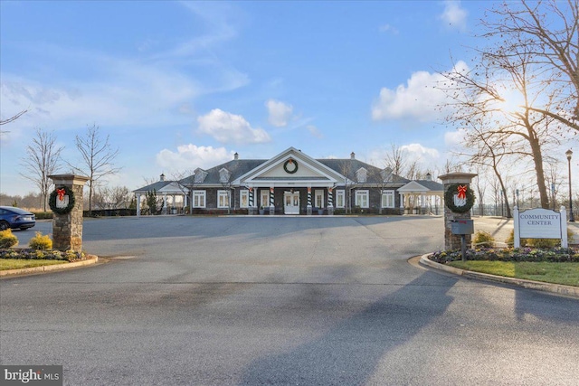 3820 Pentland Hills Dr, Upper Marlboro, MD 20774 - view of asphalt road featuring curbs and street lighting
