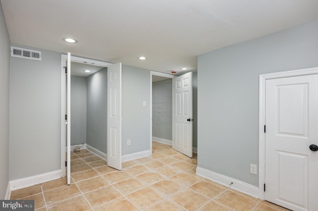 2621 E Monument St, Baltimore, MD 21205 - unfurnished room featuring recessed lighting, light tile patterned flooring, and baseboards