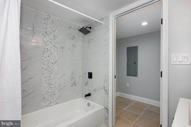 2621 E Monument St, Baltimore, MD 21205 - full bath with electric panel, shower / bath combo with shower curtain, and baseboards