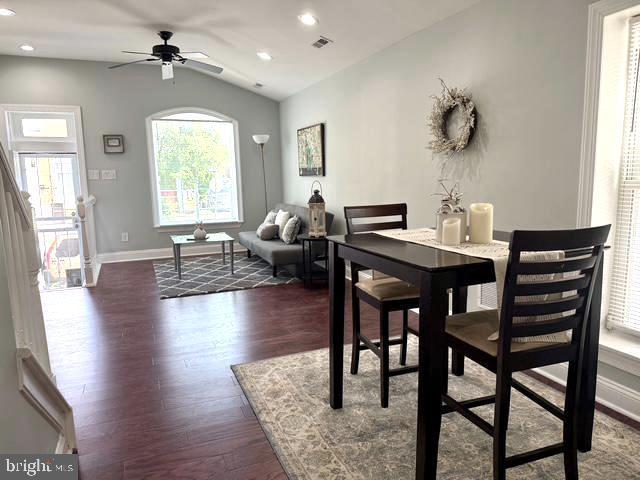 2621 E Monument St, Baltimore, MD 21205 - dining space with vaulted ceiling, dark wood-style flooring, ceiling fan, baseboards, and recessed lighting
