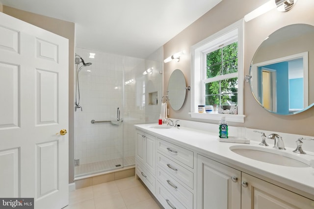 201 Pondview Ct, Chestertown, MD 21620 - bathroom featuring a shower stall, double vanity, and tile patterned floors