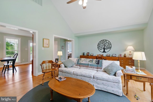 201 Pondview Ct, Chestertown, MD 21620 - living area featuring light wood-type flooring, high vaulted ceiling, ceiling fan, and baseboards