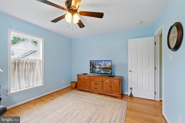 201 Pondview Ct, Chestertown, MD 21620 - living room featuring light wood-style floors, ceiling fan, and baseboards