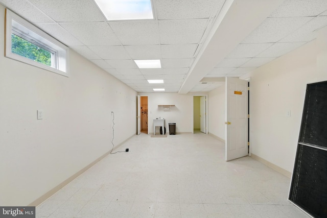 201 Pondview Ct, Chestertown, MD 21620 - basement with a paneled ceiling, light floors, and baseboards