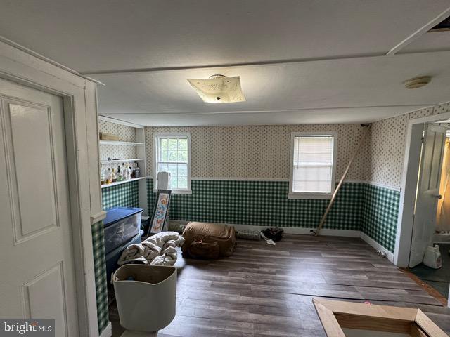 4 Quaker St, Port Elizabeth, NJ 08348 - spare room with wallpapered walls, a wainscoted wall, wood finished floors, and a smoke detector