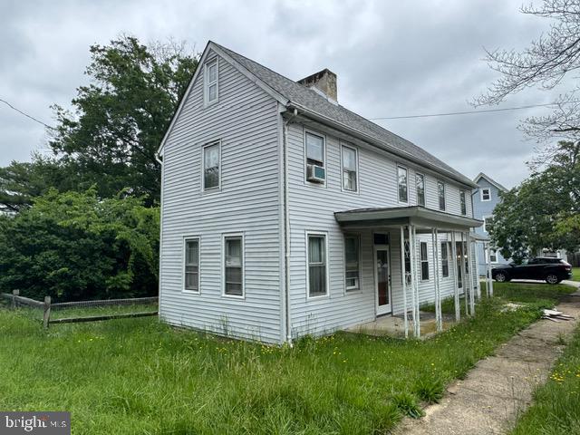 4 Quaker St, Port Elizabeth, NJ 08348 - view of home's exterior with a chimney and cooling unit