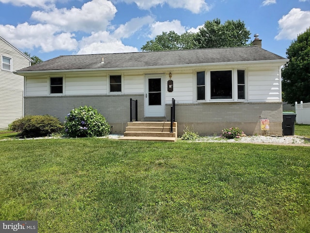 43 Springlake Dr, Newark, DE 19711 - ranch-style home with entry steps, brick siding, a chimney, and a front yard