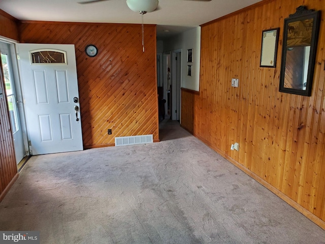 43 Springlake Dr, Newark, DE 19711 - unfurnished room featuring wooden walls, carpet floors, and a ceiling fan
