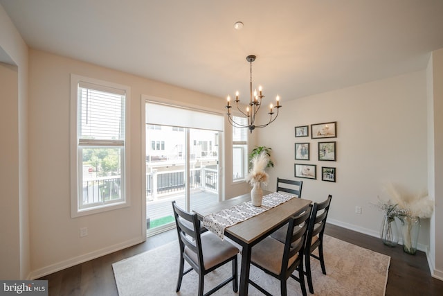 301 Star Tavern Ln, West Chester, PA 19382 - dining area with a chandelier, baseboards, and dark wood finished floors