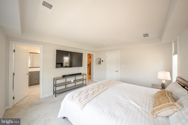 301 Star Tavern Ln, West Chester, PA 19382 - bedroom featuring light colored carpet, a tray ceiling, baseboards, and ensuite bath