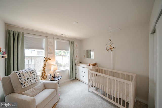 301 Star Tavern Ln, West Chester, PA 19382 - bedroom featuring light colored carpet, baseboards, and a nursery area