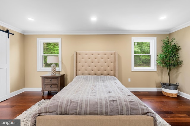 2006 Par Dr, Doylestown, PA 18901 - bedroom with a barn door, ornamental molding, dark wood-style flooring, baseboards, and recessed lighting