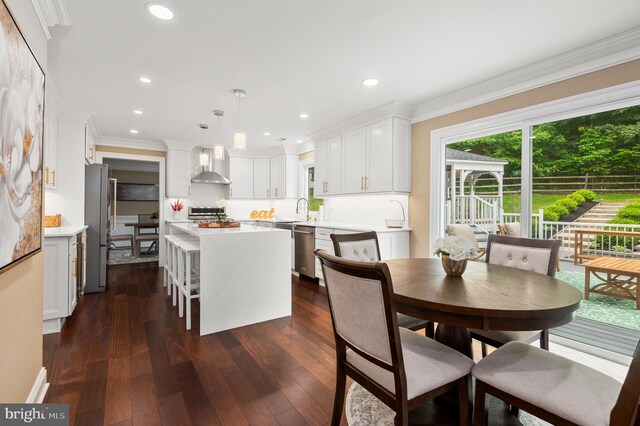 2006 Par Dr, Doylestown, PA 18901 - dining space with dark wood-type flooring, crown molding, and recessed lighting
