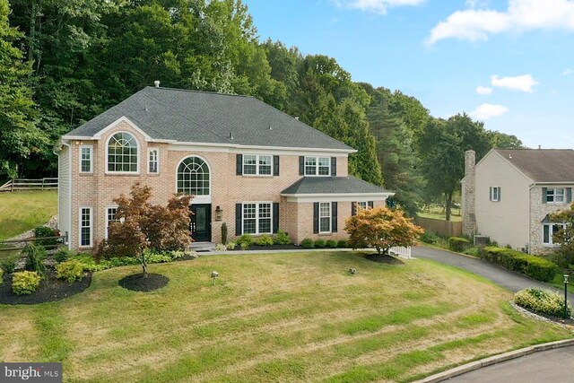 2006 Par Dr, Doylestown, PA 18901 - colonial inspired home with brick siding and driveway
