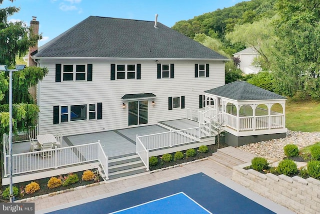 2006 Par Dr, Doylestown, PA 18901 - back of house featuring a gazebo, a chimney, roof with shingles, and a deck