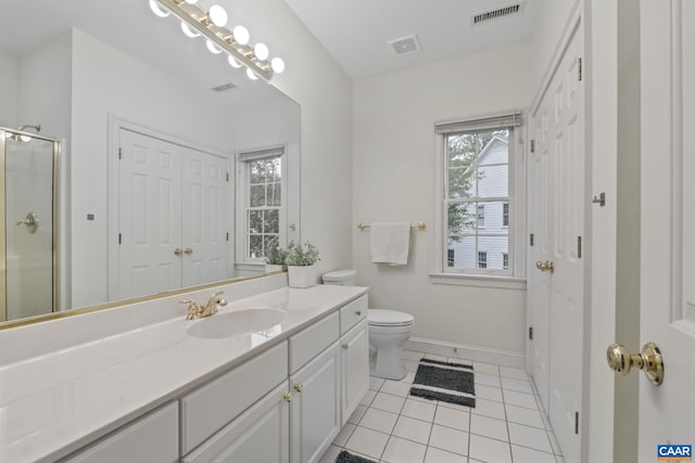 2402 Pendower Ln, Keswick, VA 22947 - bathroom with vanity, tile patterned flooring, a shower with shower door, toilet, and baseboards
